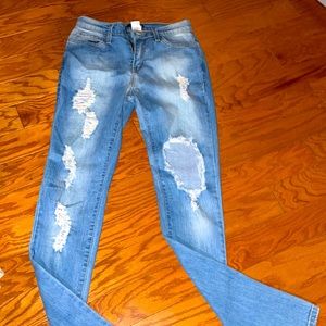 Fashion Nova high waisted deconstructed jeans